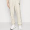 Wood Wood Jogginghose - Off White 1 Wood Wood Jogginghose - Off White -Indicode Jeans Verkäufe 1877fb350a0c42d38ecc51026a9bc8e3