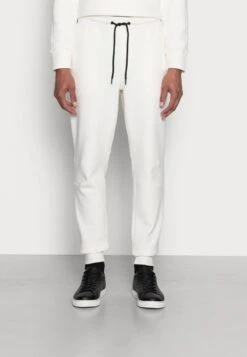 Calvin Klein COMFORT DEBOSSED LOGO SWEATPANTS - Jogginghose - Egret