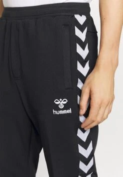 Hummel NATHAN 2.0 TAPERED PANTS - Jogginghose - Black -Indicode Jeans Verkäufe 8340be52b5e34e87b4f7cf9edc14c3da