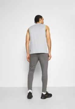 Nike Performance PANT TAPER - Jogginghose - Charcoal Heather/black -Indicode Jeans Verkäufe c54f95c2adce41f5a2a15c79d46a0a43