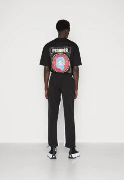 Pegador DEMERE WIDE TRACK PANTS UNISEX - Jogginghose - Black/white 10 Pegador DEMERE WIDE TRACK PANTS UNISEX - Jogginghose - Black/white -Indicode Jeans Verkäufe ee4f0d2f9c7b4bd2bcbd00eeac6ff4de