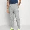 Nike Sportswear CLUB PANT - Cargohose - Grey Heather/matte Silver/white -Indicode Jeans Verkäufe f0a52e61396f4044ba93b2daefadf513
